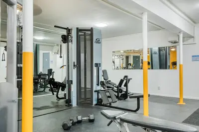 a gym with treadmills and ellipticals in a building at Hollywood 1BR w Pool WD Gym nr Metro LAX-867 in Los Angeles