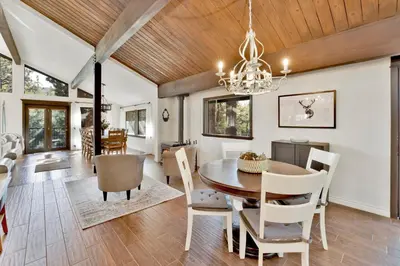 a dining room with a table and chairs at Soaring Pines by Big Bear Vacations Central Cozy Estate Chalet in Big Bear Lake
