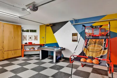a childrens play room with a ping pong table at The Lost Compass- Hot Tub- Games- Walk To Lake or Marina in Big Bear Lake