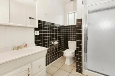 a bathroom with a toilet and a sink and a shower at Cozy Summit- Cozy Central Resort Chalet- Minutes to Activities in Big Bear Lake