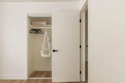 a closet with a white door in a room at 30 PCT OFF! Malibu Villa, Ocean View, Beach, Hiking in Malibu