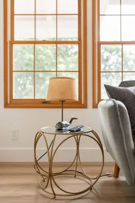 a table with a lamp and a chair in a room at 30 PCT OFF! Malibu Villa, Ocean View, Beach, Hiking in Malibu