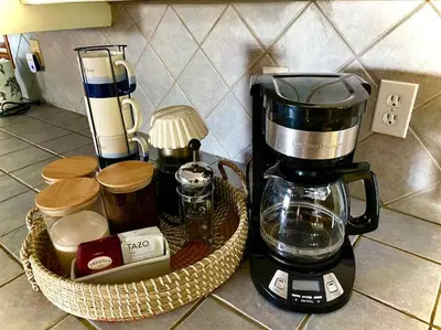 a coffee maker sitting on a counter next to a basket at Malibu Ocean Villa with King Bed, Hot Tub, Beach, BBQ in Malibu