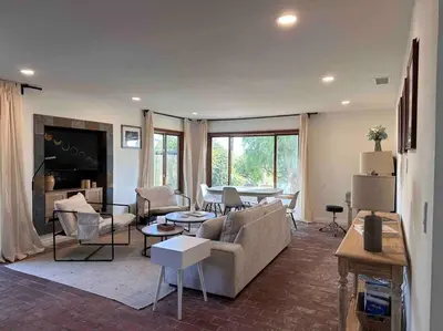 a living room with a couch and a table at Malibu Ocean Villa with King Bed, Hot Tub, Beach, BBQ in Malibu