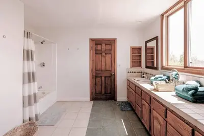 a bathroom with a sink and a shower and a mirror at Malibu Ocean Villa with King Bed, Hot Tub, Beach, BBQ in Malibu