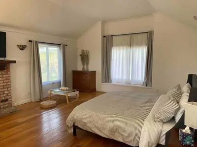 a bedroom with a bed and a fireplace at 30 PCT OFF! Malibu Romantic Suite, Ocean View, Beach in Malibu