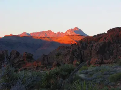 a view of a mountain range with red rocks at Sierra Motor Lodge - A Sierra Blue Hotel in Mojave