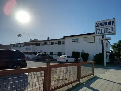 a motel sign in front of a parking lot at Sierra Motor Lodge - A Sierra Blue Hotel in Mojave