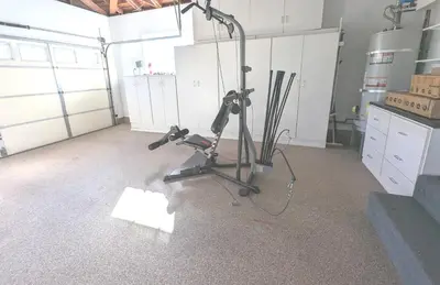 a room with a gym with equipment in it at 4 BR Encino Home w/ Amazing Yard, Near Everything in Encino