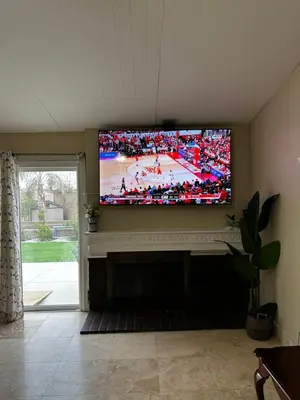 a living room with a large flat screen tv at Buxton Private Room and Bath Wheel Chair Access in Rialto