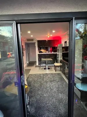 a view of a living room from a sliding glass door at Updated Gorgeous studio condo in West Hollywood with Pool in Los Angeles