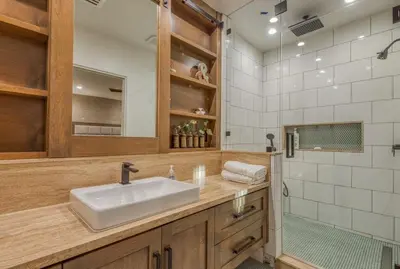 a bathroom with a sink and a shower at Lake Front Modern Luxury in Lake Arrowhead