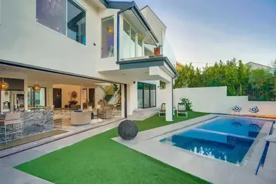 a house with a swimming pool and a backyard at Troy Hill in Los Angeles