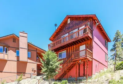 an apartment building with balconies on the side of it at Ben's Cool Cabin - Phenomenal views and an ideal location close to all the local attractions! in Big Bear Lake