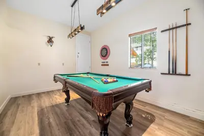 a room with a pool table in it at The Bear Den - DREAM LOCATION WALKING DISTANCE TO LAKE AND VILLAGE! in Big Bear Lake