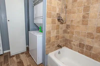a bathroom with a tub and a toilet and a shower at Honey Bear - Close to lake and village in Big Bear Lake