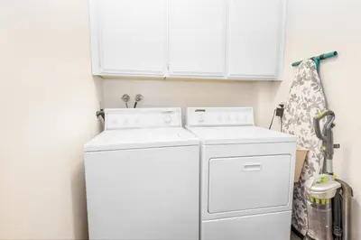 a white washer and dryer in a laundry room at Snow Summit Getaway - Walk to Snow Summit Ski Resort in Big Bear Lake
