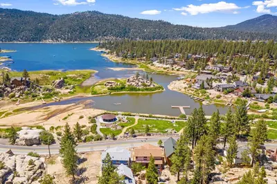 an aerial view of a town and a lake at Summit Condo - Luxury condo, walk to the slopes! in Big Bear Lake