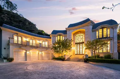 a house with a driveway in front of it at Le Jardin in Los Angeles