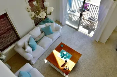 an overhead view of a living room with couches and a table at Beach House located in quiet community. in Oxnard
