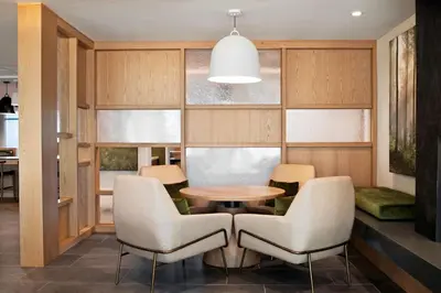 a dining room with a table and chairs at Fairfield by Marriott Inn & Suites Chino in Chino