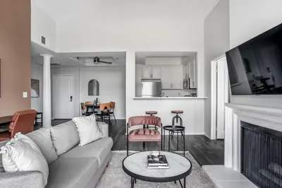 a living room with a couch and a fireplace at West LA 2br w rooftop courtyard LAX-1055 in Los Angeles