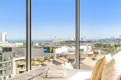 a view of a city from a room with windows at #Marbella Lane - Panoramic Delight Dream Escape! in Long Beach