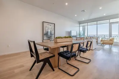 a dining room with a wooden table and chairs at #Marbella Lane - Panoramic Delight Dream Escape! in Long Beach