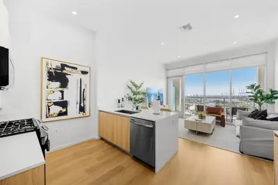 a kitchen and living room with a view of the city at #Marbella Lane - Panoramic Splendid Ocean Views! in Long Beach