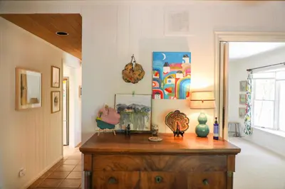 a hallway with a wooden dresser in a room at Ojai Vacation Home with Views on the East End in Ojai