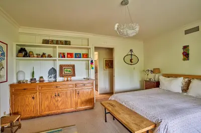 a bedroom with a large bed and a wooden dresser at Ojai Vacation Home with Views on the East End in Ojai