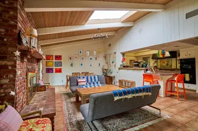 a living room with a couch and a table at Ojai Vacation Home with Views on the East End in Ojai