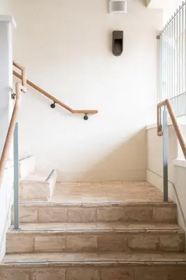 a staircase in a building with a skateboard on the wall at Gjelina Hotel in Los Angeles
