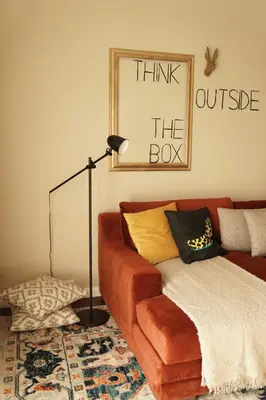 a living room with a couch and a lamp at Lux Oasis in West Hollywood, Free Parking & Swimming pool in Los Angeles