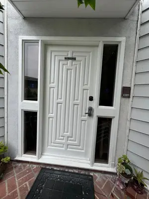 a white door with a cross on it on a house at Large Luxury Studio with View in Santa Monica in Santa Monica