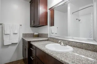 a bathroom with a sink and a mirror at Westside 1BR w Pool Gym Bball Tennis Courts LAX-85 in Los Angeles