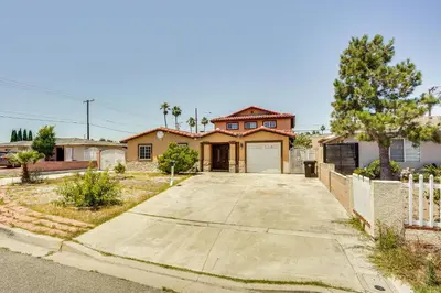a home in the desert with a driveway at Westminster Apartment Near Beaches and Theme Parks! in Westminster