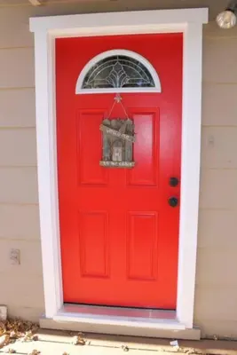 a red door with a basket on top of it at Beautiful Lake View House for rent! in Lake Arrowhead