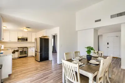 a kitchen and dining room with a table and chairs at Quiet Ridgecrest Vacation Rental with Private Yard! in Ridgecrest
