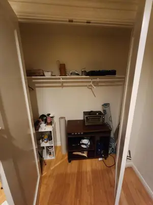 a hallway with a room with a desk and shelves at Hollywood Hills Hideout Apartment! in Los Angeles