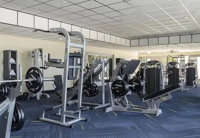 a gym with treadmills and machines in a room at Luxurious Hollywood Dream in Los Angeles