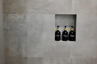 three bottles of wine in a niche in a wall at Exclusive Hillside Hideaway-Private Room in Los Angeles