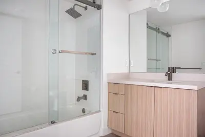 a bathroom with a sink and a shower at West LA 1br w rooftop gym nr restaurants LAX-1103 in Los Angeles