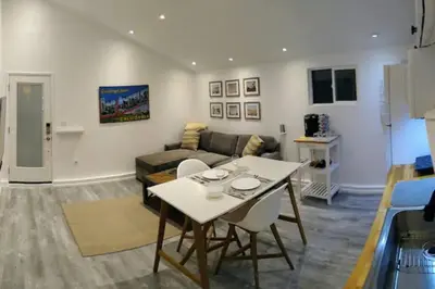 a living room with a table and a couch at Monthly - Cozy 1 Bed Guest Suite near Venice Beach in Los Angeles