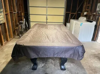 a bed in a room in a building at Pool Table A C Grill Out Netflix Bikes Yard in Fullerton