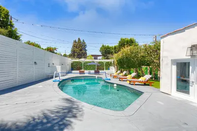 a swimming pool in the backyard of a house at Universal Studios Villa with Pool & Guesthouse in Los Angeles