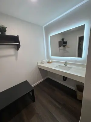 a bathroom with a sink and a mirror at Deep Creek in Arrowbear Lake