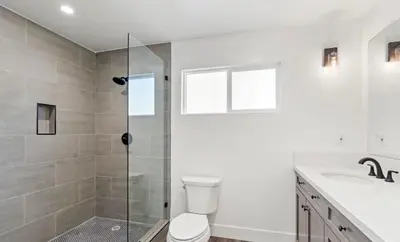 a bathroom with a shower and a toilet and a sink at Bright Corner Home Retreat Near SoFi in Los Angeles