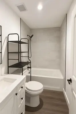 a white bathroom with a toilet and a bath tub at Bright Corner Home Retreat Near SoFi in Los Angeles