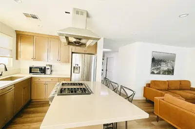 a kitchen with a white counter top in a room at Bright Corner Home Retreat Near SoFi in Los Angeles